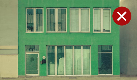 building with green coloured exterior paint
